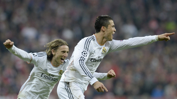 Cristiano Ronaldo (R) celebrates scoring his second and Real Madrid's fourth goal