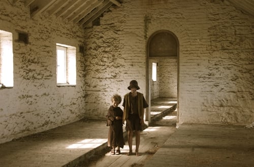 A reconstructed image of children arriving at a workhouse