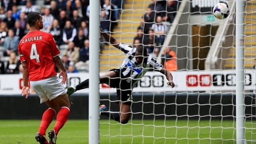 Shola Ameobi's header finds the back of the net