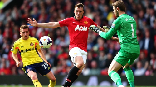 Phil Jones and his United team-mates are not giving up hope of catching leaders Chelsea