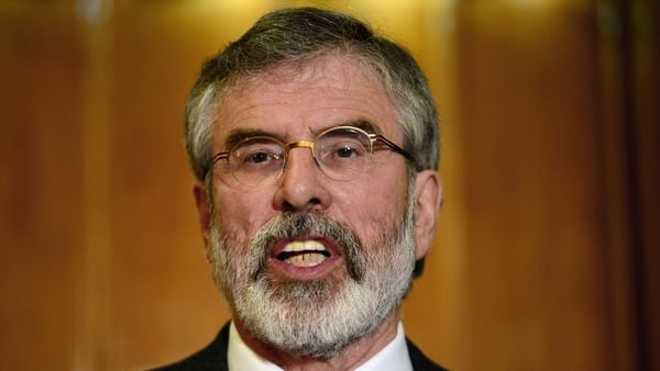 Gerry Adams said he would ask Peter Robinson to explain his statement about Northern institutions being under threat