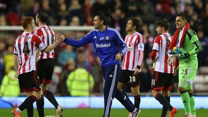 Gus Poyet celebrates with Jack Colback and his players after Sunderland seal safety with a win over West Brom
