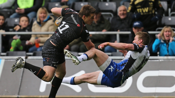 Ospreys' Jeff Hassler brushes off Connacht's Eoin Griffin on his way to scoring a try
