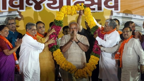 Narendra Modi addressed cheering supporters today after a landslide Indian election victory