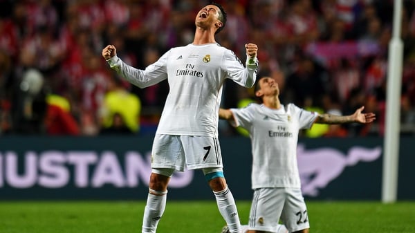 Cristiano Ronaldo and Angel Di Maria celebrate the final whistle in Lisbon.