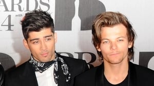 Zayn Malik and Louis Tomlinson during their One Direction years