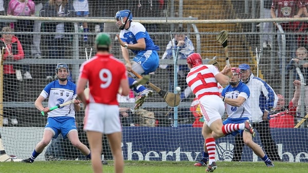 Stephen O'Keefe saves Anthony Nash's penalty by rushing off his line before the sliotar is struck