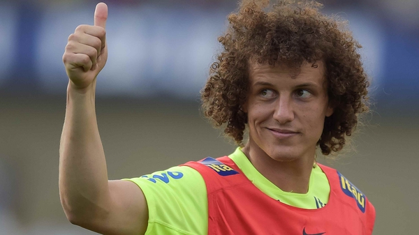 Brazil's David 'Krusty the Clown' Luiz gestures a sign of approval to the crowd