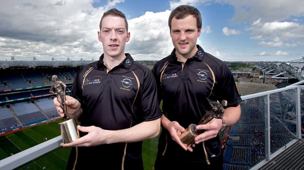 Laois hurler Stephen Maher (L) and Donegal footballer Michael Murphy with their awards at Croke Park