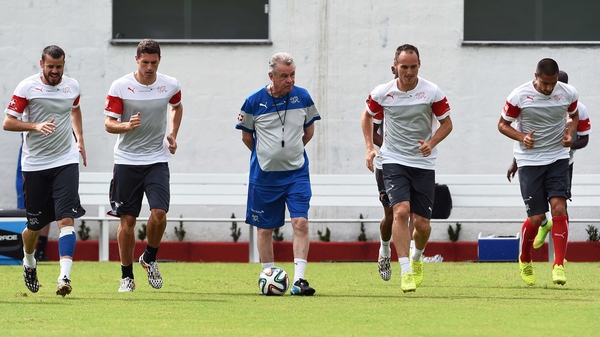Switzerland's German coach Ottmar Hitzfeld (centre) oversees a training session of his players