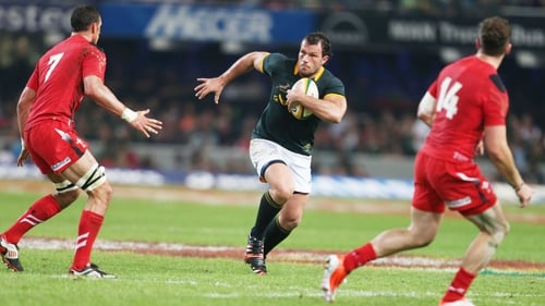 South Africa's Bismarck du Plessis charges at the Wales defence