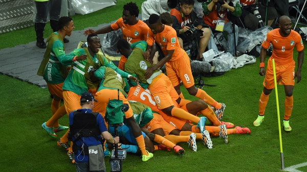 Ivory Coast celebrate with winning goalscorer Gervinho