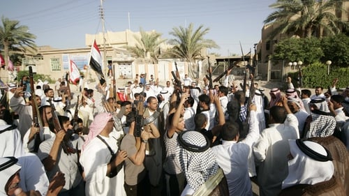 Iraqi volunteers fighting with Iraqi forces chant slogans in Karbala city, southern Baghdad