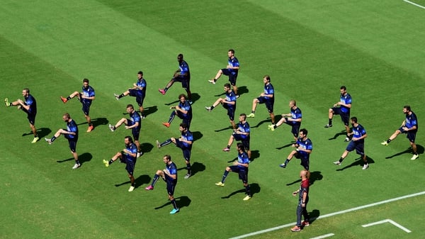 Italy's squad warm up during a training session at the Pernambuco Arena in Recife