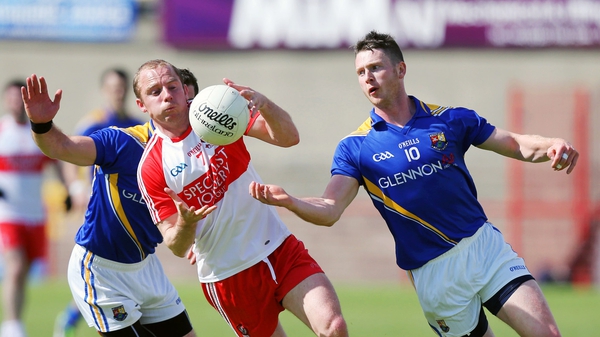 Derry's Sean Leo McGoldrick in action against Longford's Michael Quinn and Aidan Rown