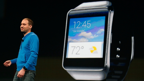 David Singleton, Director of Engineering of Android at Google, stands in front of a Samsung Gear Live
