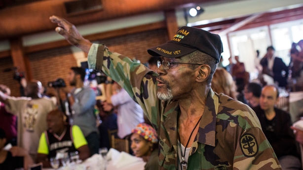 Man dances at homeless lunch