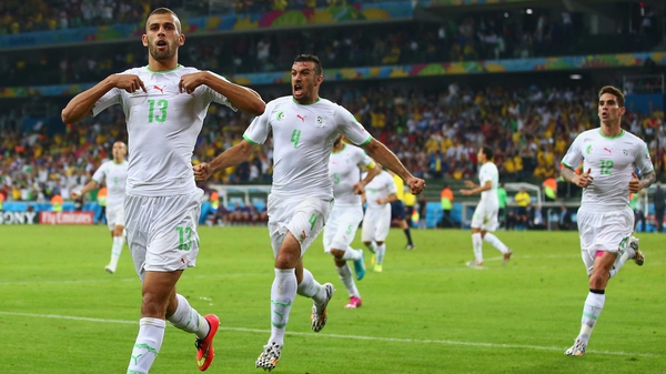 Islam Slimani celebrates the goal that put Algeria into the last 16