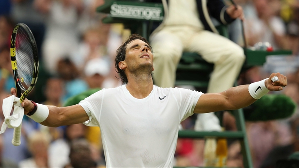 Nadal looks to the heavens after victory