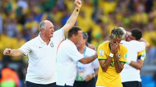 Brazil coach Luiz Felipe Scolari (L) and Neymar react after their side beat Chile on penalties