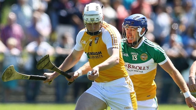 Antrim's Neil McAuley and Brian Carroll of Offaly