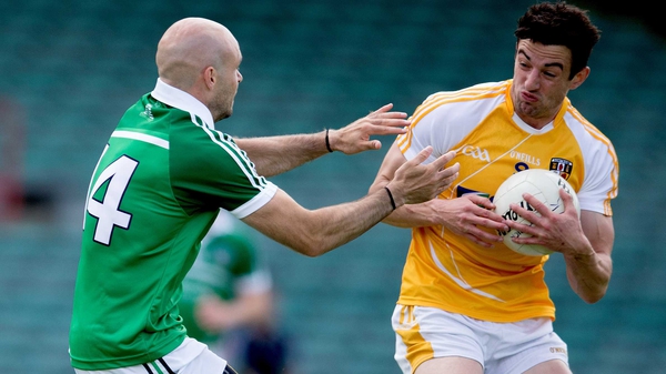 Limerick's Killian Phair tries to dispossess Niall McKeever