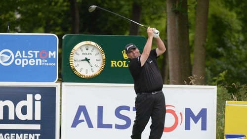 Kevin Stadler plays his first shot on the 14th tee during the third round