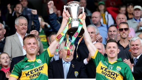 Kerry's Fionn Fitzgerald and Kieran O'Leary lift the cup
