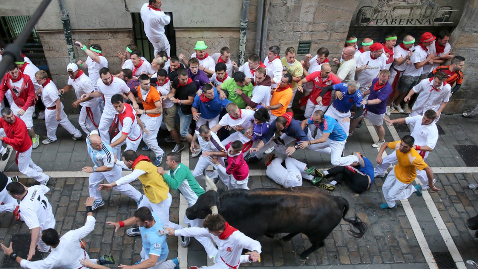 US author badly gored during Pamplona bull run