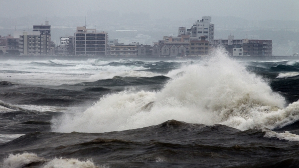 Huge waves generated by typhoon Neoguri hit Mizugama beach in Kadena, on the island of Okinawa