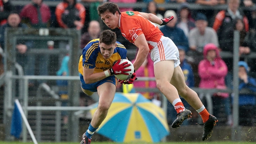Roscommon's Conor Daly and James Morgan of Armagh clash