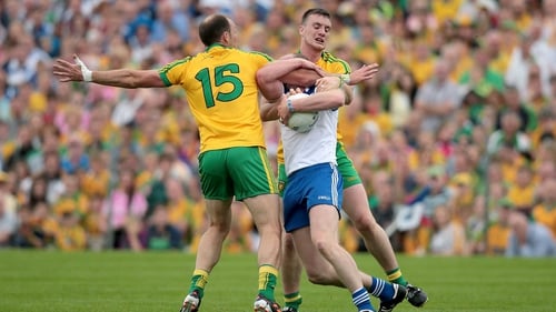 Monaghan's Dick Clerkin with Colm McFadden and Leo McLoone of Donegal
