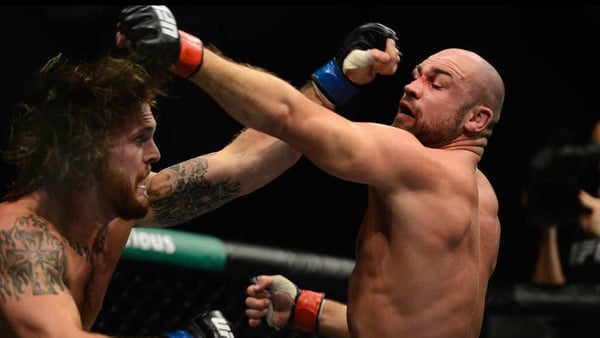 Mike King (left) in action against Cathal Pendred