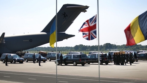 Hearses line the runway at Eindhoven Airport as the bodies are brought to the Netherlands from Ukraine