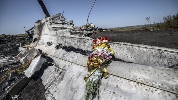 Flowers left at the site of the crash by family members of an Australian victim