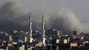 Smoke rises after Israeli air strikes in the north of Gaza City