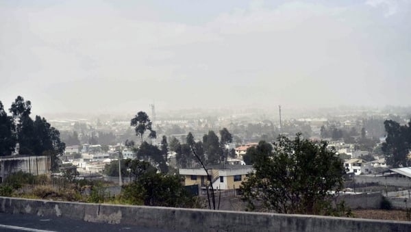 View of a dust cloud in Quito, after a
5.1-magnitude earthquake hit the Ecuadoran capital