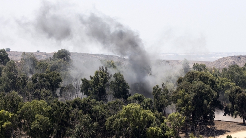 A picture taken from the southern Israeli border with Gaza shows smoke rising from the remains of a mortar fired by Palestinian militants into Israel