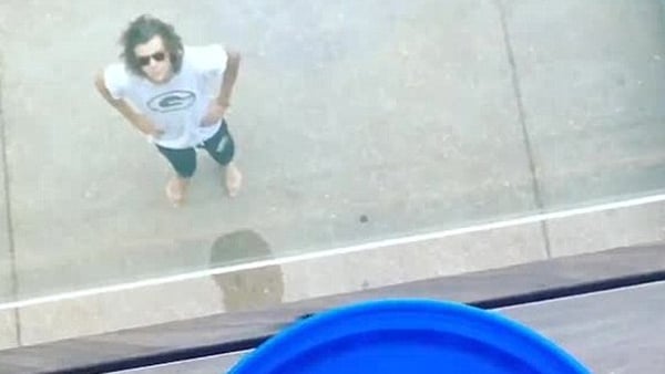 Harry bracing himself ahead of his balcony Ice Bucket Challenge drop. Source: Instagram