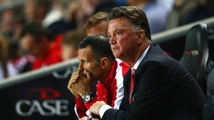 Louis van Gaal and his assistant manager Ryan Giggs look in in dismay as United are humbled by MK Dons