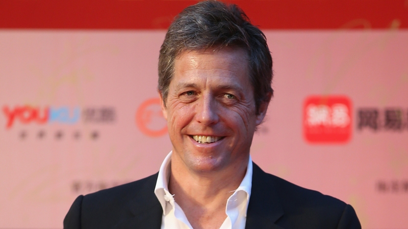 Hugh Grant describes acting award win as a 'novelty'