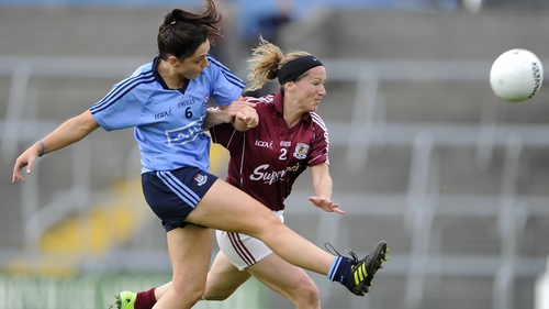Dublin's Sinead Goldrick scores a point despite the effort of Noelle Connolly of Galway