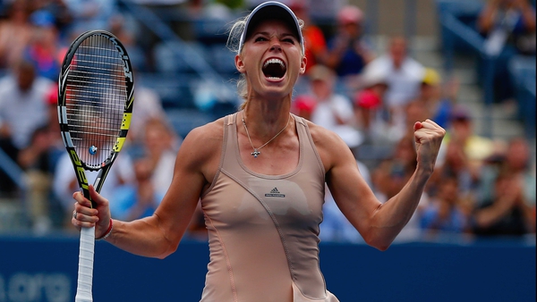 Caroline Wozniacki celebrates one of her biggest wins in recent years