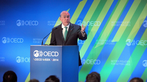 OECD's director general Angel Gurria cuts growth forecasts for most advanced economies