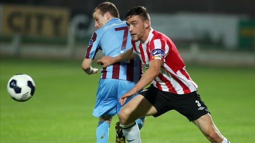 Derry's Dean Jarvis gets the better of Cathal Brady of Drogheda