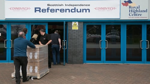 People prepare the inside of the Highland Hall where the Edinburgh count and referendum declaration will be made on Friday