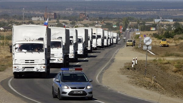Lorries from the aid convoy approach the Ukrainian border at the Donetsk-Izvarino border checkpoint