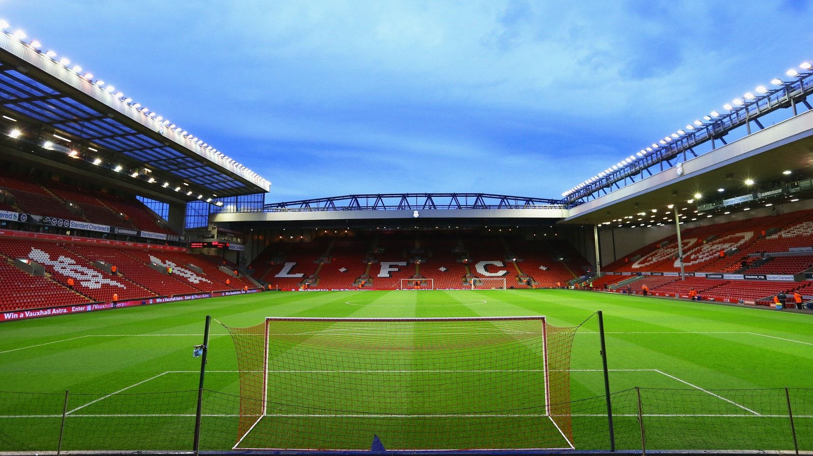 Llegiant stadium. Стадион ФК Ливерпуль. Футбольный стадион Ливерпуль Энфилд. Энфилд роуд стадион. Ливерпуль Энфилд.