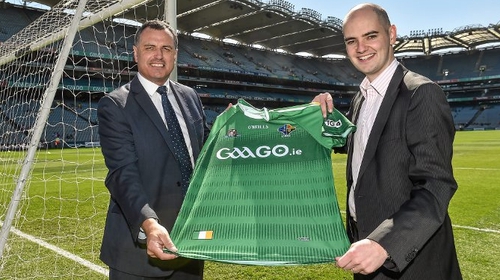 Ireland manager Paul Earley (l) and Noel Quinn, media rights manager with the GAA pictured with the new jersey