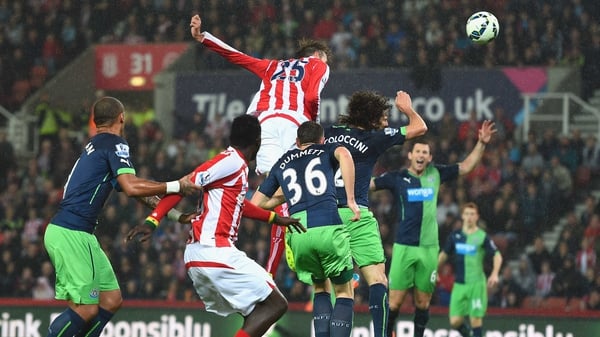 Peter Crouch rises highest to score the game's winner
